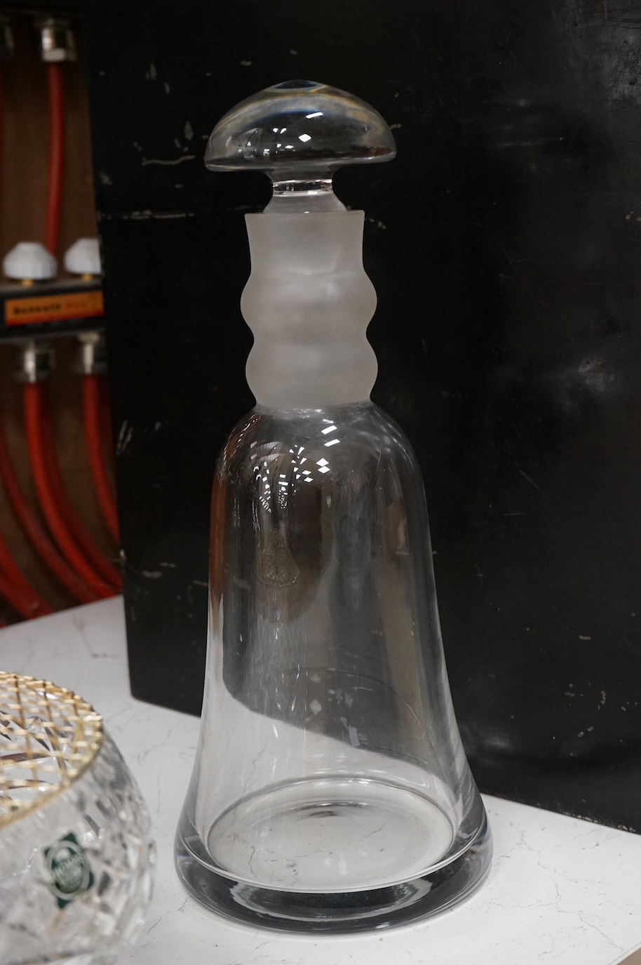 A Webb Corbett bowl, two decanters and another decanter, largest 30cm high